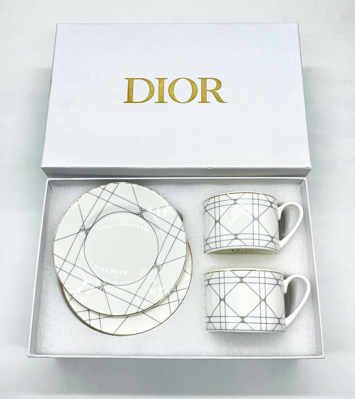 Dior cup setÂ of two tea cups with saucers